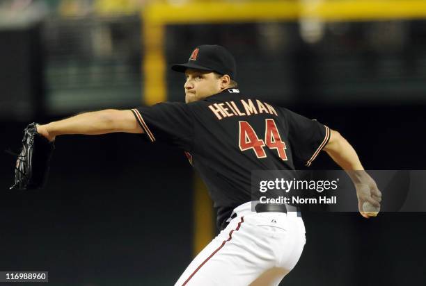 Pitcher Aaron Heilman of the Arizona Diamondbacks delivers a pitch against the Chicago White Sox at Chase Field on June 18, 2011 in Phoenix, Arizona....
