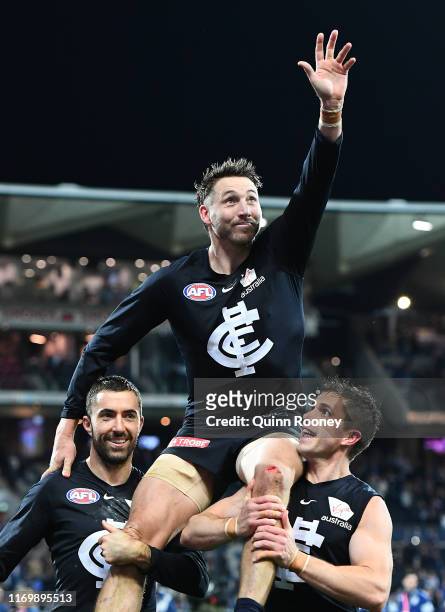 Dale Thomas of the Blues is chaired off in his final game for the Blues during the round 23 AFL match between the Geelong Cats and the Carlton Blues...