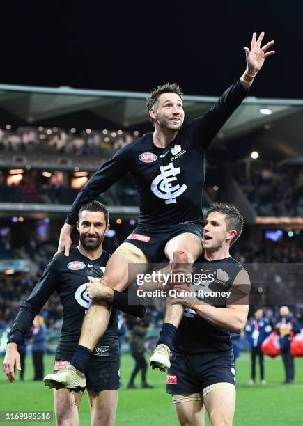 Dale Thomas of the Blues is chaired off in his final game for the Blues during the round 23 AFL match between the Geelong Cats and the Carlton Blues...