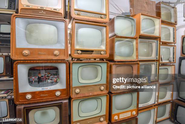 September 2019, Brandenburg, Trebus: Old television sets from GDR times belong to an exhibition of the IFA friends Trebus. The former German state on...