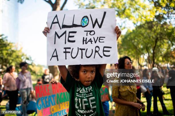 Students participate in the Global Climate Strike march on September 20, 2019 in New York City. - Crowds of children skipped school to join a global...