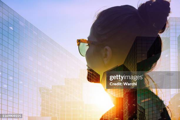 she is thinking of new strategies - digital composite woman stock pictures, royalty-free photos & images