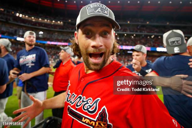 Charlie Culberson of the Atlanta Braves reacts at the conclusion of an MLB game against the San Francisco Giants in which they clinched the NL East...