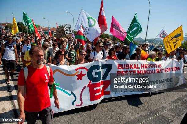 Protesters protest against the annual G7 Summit, 30 kilometres south of the G7 gathering in Biarritz, on August 24, 2019 in Hendaye, France. The...