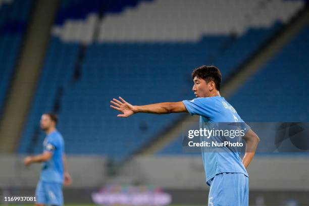 Jung Woo-young orchestrates his teammates for a free kick during Al Sadd v Umm Salal in the QNB Stars League on September 20 2019 in the Al Janoub...
