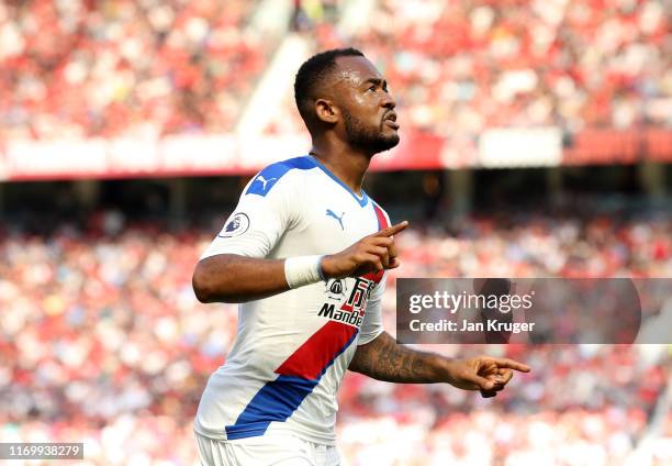 Jordan Ayew of Crystal Palace celebrates scoring the opening goal during the Premier League match between Manchester United and Crystal Palace at Old...