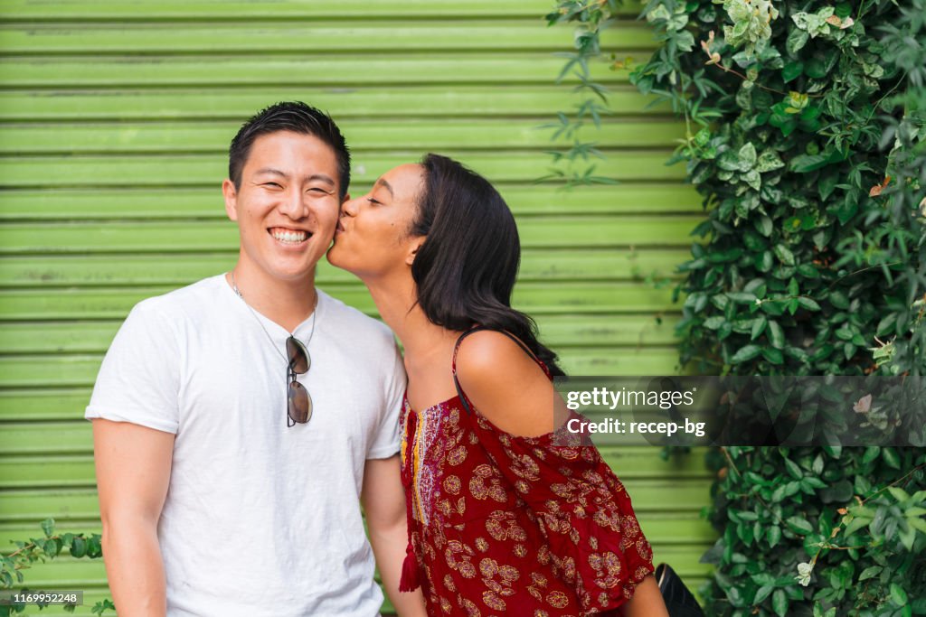 Girlfriend kissing her boyfriend