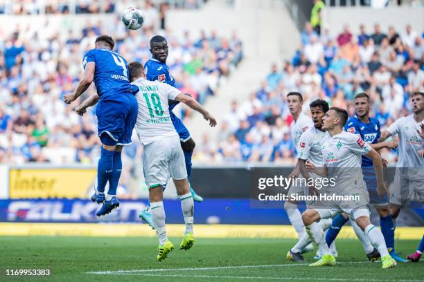 Ermin Bicakcic of Hoffenheim scores his team's second goal with a header during the Bundesliga match between TSG 1899 Hoffenheim and SV Werder Bremen...