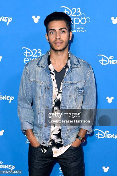 Mena Massoud attends Go Behind The Scenes With Walt Disney Studios during D23 Expo 2019 at Anaheim Convention Center on August 24, 2019 in Anaheim,...