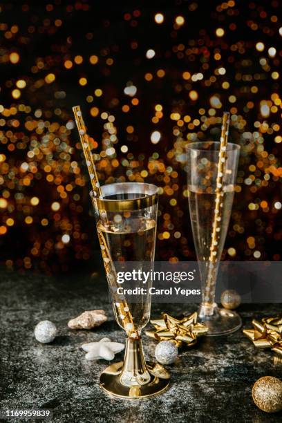 new year's with glass of sparkling champagne - new years eve 2020 stock pictures, royalty-free photos & images