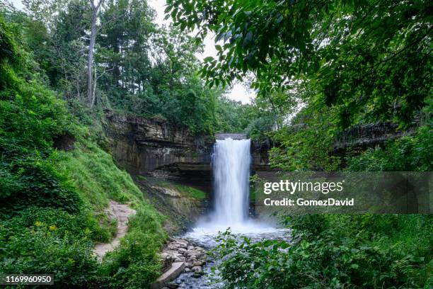 minnehaha falls in the twin cities. - minnesota nature stock pictures, royalty-free photos & images