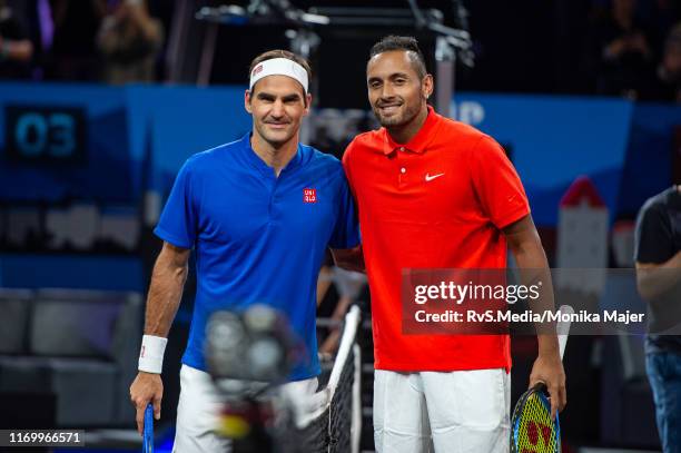 Roger Federer of Team Europe and Nick Kyrgios of Team World poses for photo during Day 2 of the Laver Cup 2019 at Palexpo on September 21, 2019 in...