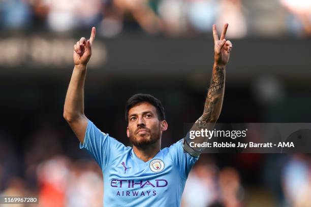 David Silva of Manchester City celebrates after scoring a goal to make it 1-0 during the Premier League match between Manchester City and Watford FC...