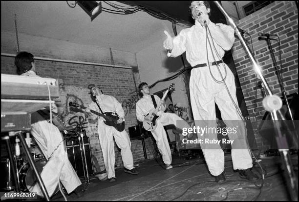 The members of American New Wave band Devo performing at the Mabuhay Gardens in San Francisco, California, US, 1977. Pictured are, from left, Bob...
