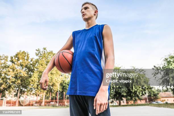 basketball player with a cool attitude - chinese people's liberation army stock pictures, royalty-free photos & images