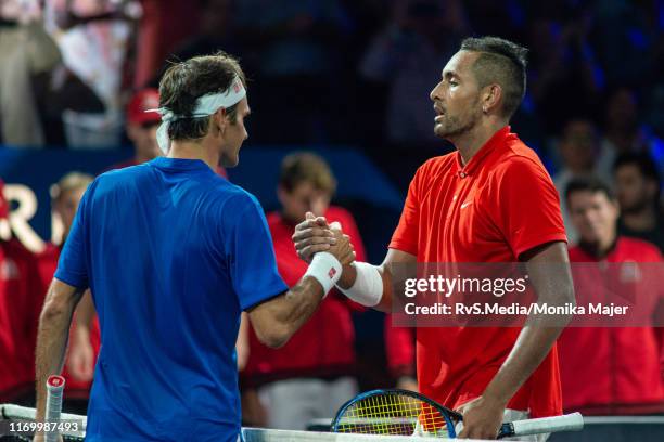 Roger Federer of Team Europe shakes hands with Nick Kyrgios of Team World during Day 2 of the Laver Cup 2019 at Palexpo on September 21, 2019 in...