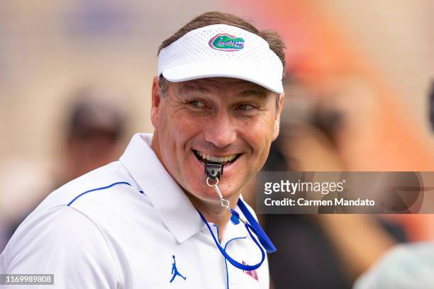 Head coach Dan Mullen of the Florida Gators looks on prior to the start of the game against the Tennessee Volunteers at Ben Hill Griffin Stadium on...