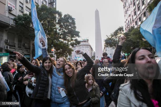 Group of women shouts pro-government slogans during a march in support of President Mauricio Macri on August 24, 2019 in Buenos Aires, Argentina.