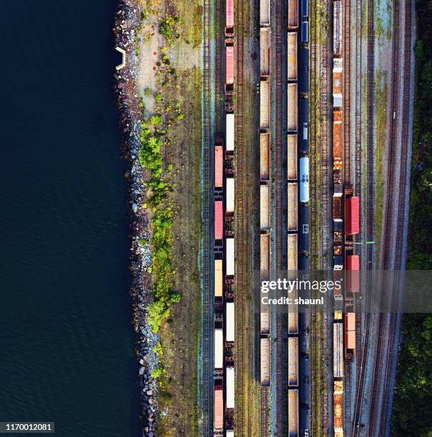 aerial view of rail yard - aerial train stock pictures, royalty-free photos & images