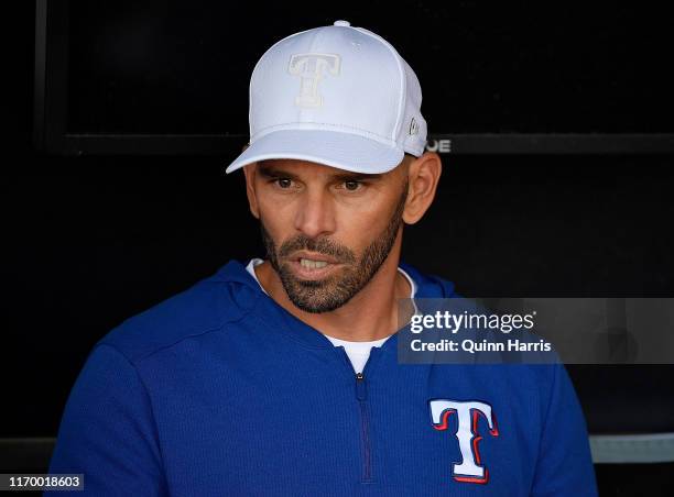 Chris Woodward of the Texas Rangers looks on before the game against the Chicago White Sox at Guaranteed Rate Field on August 24, 2019 in Chicago,...