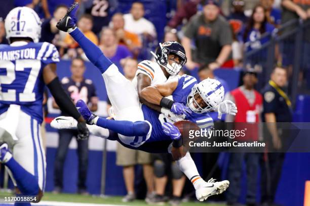 Isaiah Johnson of the Indianapolis Colts intercepts the ball during the preseason game against the Chicago Bears at Lucas Oil Stadium on August 24,...