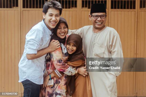 indonesian family - ramadan celebration stock pictures, royalty-free photos & images