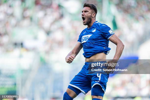 Ermin Bicakcic of Hoffenheim celebrates his team's first goal during the Bundesliga match between TSG 1899 Hoffenheim and SV Werder Bremen at...