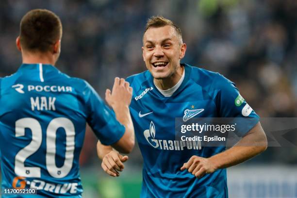 Artem Dzyuba and Robert Mak of FC Zenit Saint Petersburg celebrate a goal during the Russian Premier League match between FC Zenit Saint Petersburg...