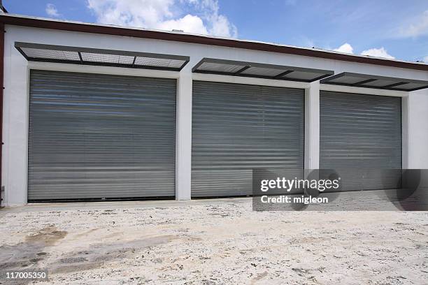 garage doors - industrial door stock pictures, royalty-free photos & images