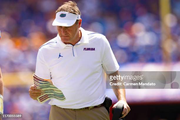 Head coach Dan Mullen of the Florida Gators looks on during the first half of the game against the Tennessee Volunteers at Ben Hill Griffin Stadium...