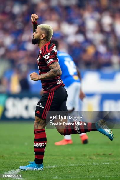 Gabigol of Flamengo celebrates a after scoring the opening goal during a match between Cruzeiro and Flamengo as part of Brasileirao Series A 2019 at...