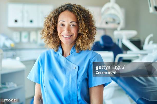 female dentist portrait - dental assistant stock pictures, royalty-free photos & images