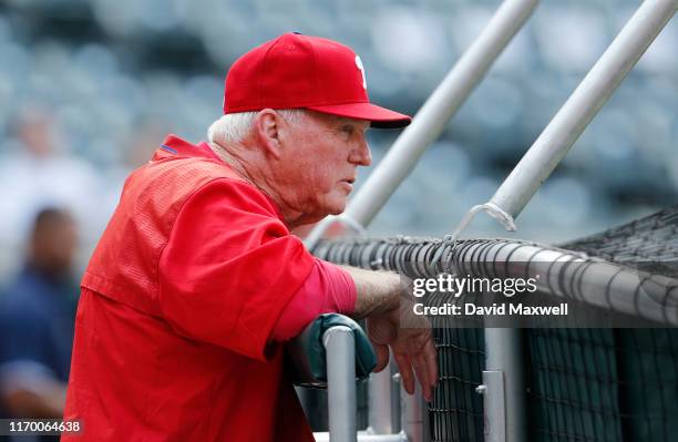 Hitting Coach Charlie Manuel of the Philadelphia Phillies looks on during batting practice before the game against the Cleveland Indians at...