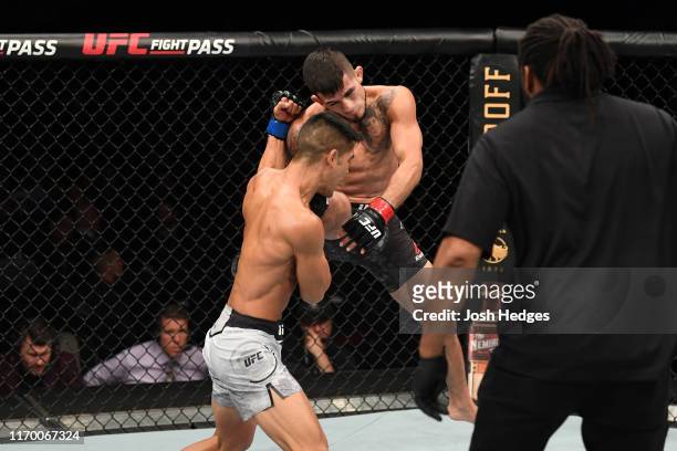 Sergio Pettis knees Tyson Nam in their flyweight bout during the UFC Fight Night event on September 21, 2019 in Mexico City, Mexico.
