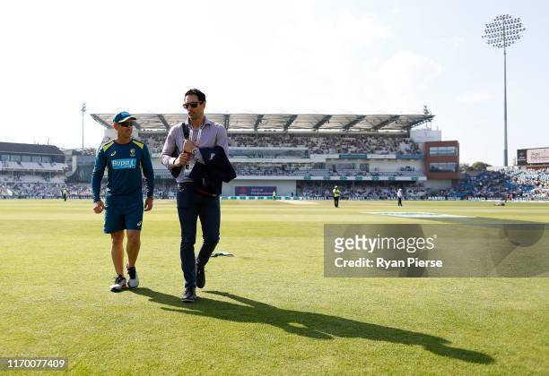 Justin Langer, coach of Australia, speaks to former Australian Test Bowler Mitchell Johnson during day four of the 3rd Specsavers Ashes Test match...