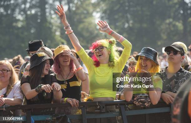Music fans watch Counterfeit perform during Leeds Festival 2019 at Bramham Park on August 25, 2019 in Leeds, England.