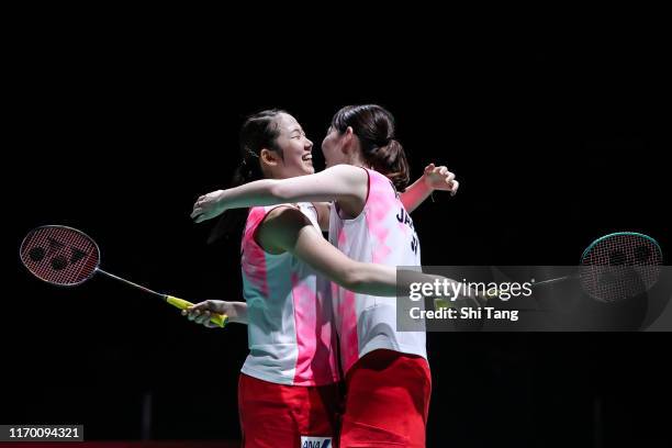 Mayu Matsumoto and Wakana Nagahara of Japan celebrate the victory in the Women's Double final match against Yuki Fukushima and Sayaka Hirota of Japan...