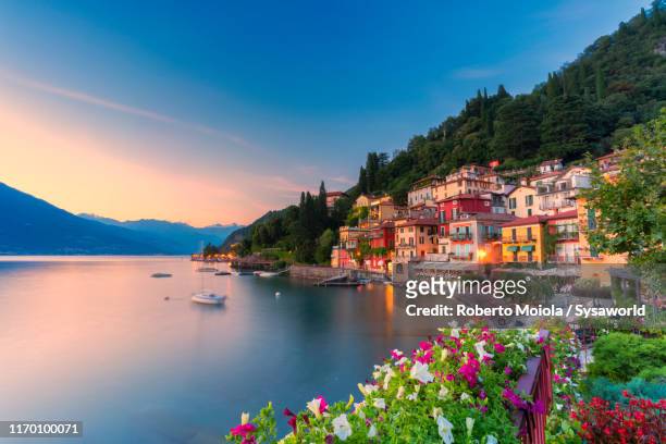 sunset over varenna, lake como, italy - italia stock pictures, royalty-free photos & images