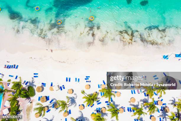 white sand beach from above, caribbean, antilles - dominican republic aerial stock pictures, royalty-free photos & images