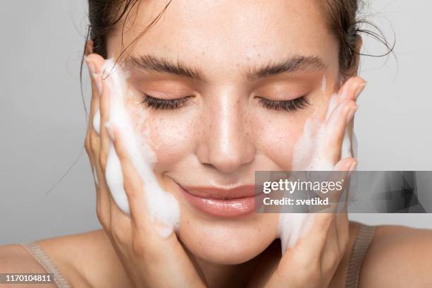 keep your skin clean - beautiful woman face stock pictures, royalty-free photos & images