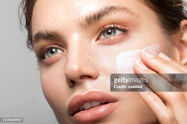 young and beautiful skin - body care and beauty stock pictures, royalty-free photos & images