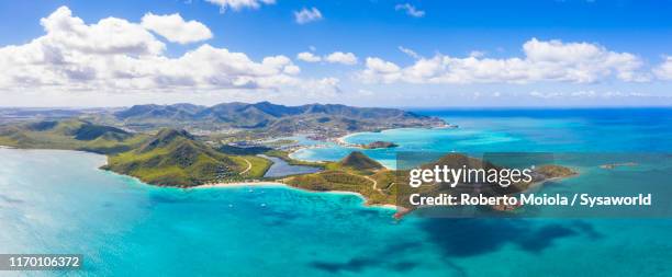 aerial view of islet in the caribbean sea, antigua - islas del índico fotografías e imágenes de stock