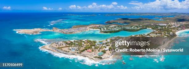 aerial panoramic of devil's bridge, antigua - antigua stock-fotos und bilder