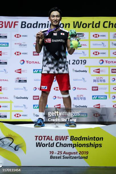 Kento Momota of Japan poses with his medal after the Men's Single final match against Anders Antonsen of Denmark during day seven of the Total BWF...