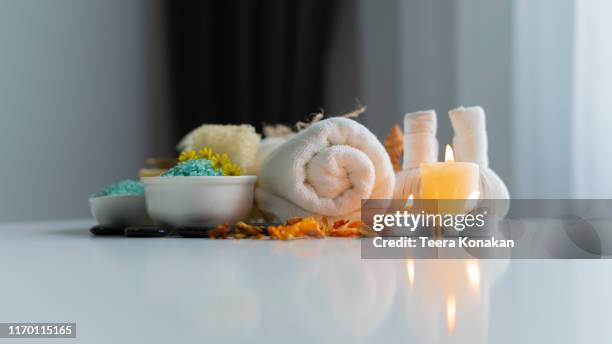 composition of spa and wellness products on table background - reflexology stock-fotos und bilder
