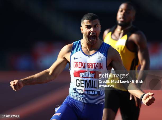 Adam Gemili of Great Britain celebrates winning the Mens 200m Final during Day Two of the Muller British Athletics Championships at the Alexander...
