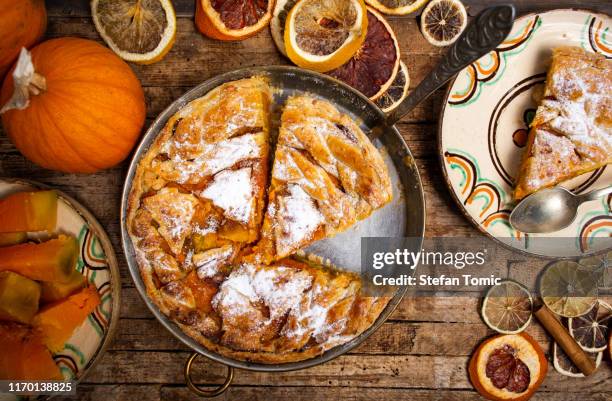 homemade pumpkin pie and ingredients - thanksgiving indulgence stock pictures, royalty-free photos & images