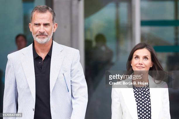 King Felipe VI of Spain and Queen Letizia of Spain leave the clinic on August 25, 2019 in Pozuelo de Alarcon, Spain.