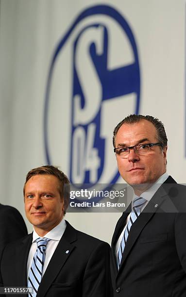 Clemens Toennies, chairman of the supervisory board, and manager Horst Heldt pose for a picture during the Schalke 04 annual general meeting at...