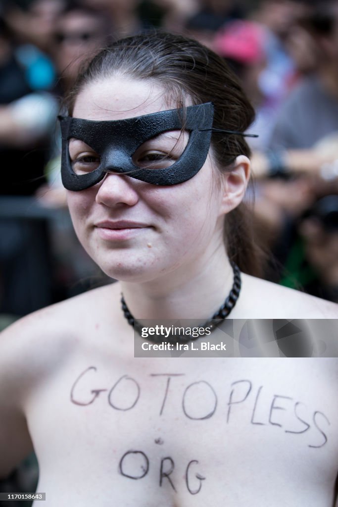A Female Supporter With Wearing A Mask And Shows Off Her News Photo a-female-supporter-with-wearing-a-mask-and-shows-off-her-news-photo